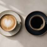 Two different coffee cups side by side on a table, a playful pairing concept