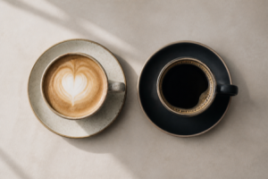 Two different coffee cups side by side on a table, a playful pairing concept