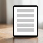 A tablet on a wooden desk showing a neat vertical stack of grey headline cards in chronological order