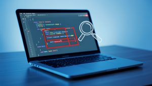 A laptop showing code with one block outlined in red and a magnifying glass over it, representing a schema audit